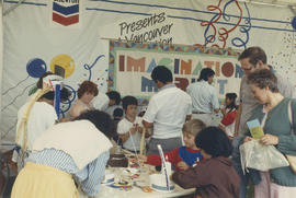 Children making crafts in the Imagination Market tent