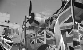 [Close up view of flags draped over first PBY Catalina produced at the Sea Island Boeing plant]