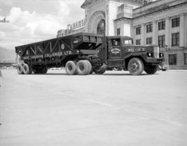 [West Canadian Collieries Ltd. freight truck in front of the C.N.R. station]