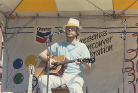 Guitarist performing on Chevron Stage