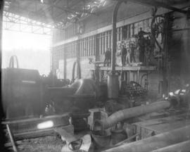 [Men assembling turbo generator unit in Brentwood Bay Steam Plant]