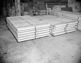 [Large, flat crates stored in the Evans, Coleman, and Evans Ltd., warehouse]