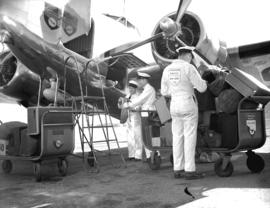 Canadian Pacific Airlines [luggage being loaded onto a plane]