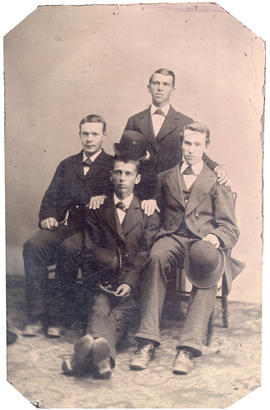 [Group portrait of W. Johnson (far left), H. Stephens, C. Stephens and J. Anderson]