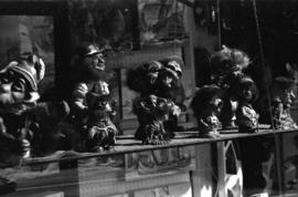 Troll figurines in storefront window