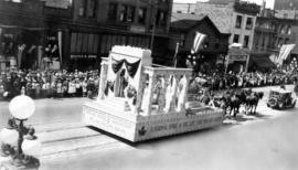 [The Native Sons and Daughters of Canada float in the Dominion Day Parade]