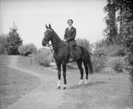 Woman riding a horse in Stanley Park