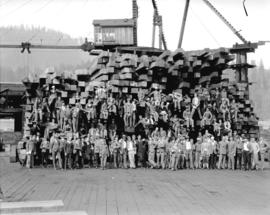 Young Australia League [group posed on lumber stack]