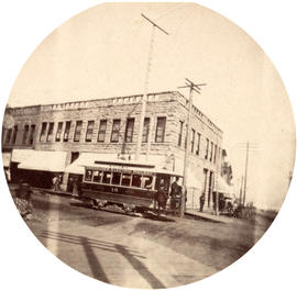 [A Vancouver Electric Railway car turning north onto Carrall Street from Cordova Street]