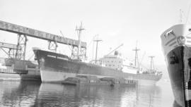 M.S. Johanna Oldendorff [at dock, with barges alongside]