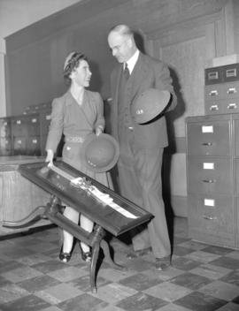 [Presentation of a coffee table to] Ruth Challenger at A.R.P. office