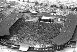 Aerial view of crowd at outdoor concert in Empire Stadium