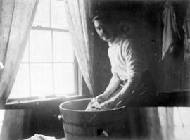 [Robert Jamieson doing laundry, Good Hope Cannery, Rivers Inlet]