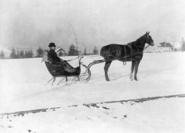 [Mr. A.M. Forbes driving his cutter in Strathcona park near 12th Avenue and Cambie Street]