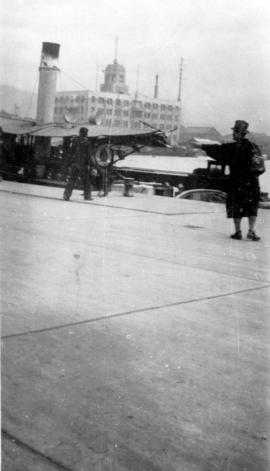 [View of a boat and a building]