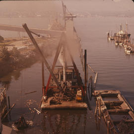 Floating crane near dock