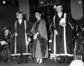 Honorary degree presented to Dr. Ethlyn Trapp by Sherwood Lett and Norman MacKenzie