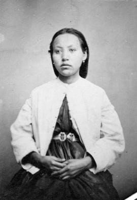 [Studio portrait of unidentified First Nations Woman in European-style clothing]