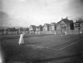 [A tournament in progress at the Vancouver Lawn Tennis Club at 940 Denman Street]