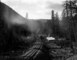 Our camp at Carmi, a loaded train leaving for the trestle