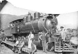 [Men posing with] No. 314 heavy grade engine at Field, B.C., C.P.R.