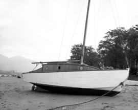 [Yacht "Jeanine" on Kitsilano Beach after a storm]