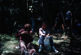 [Children sitting on the grass]