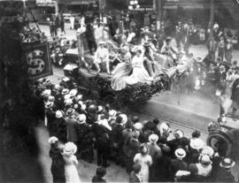 [Unidentified float in the 600 Block of Granville Street during a Victoria Day parade]