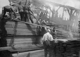 [Fire fighter at a lumber yard]