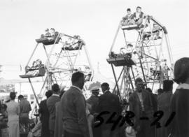 Children on small Ferris wheel in P.N.E. Kiddieland