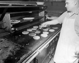 Cook [in] lunch house at Pacific Mills, Queen Charlotte Islands