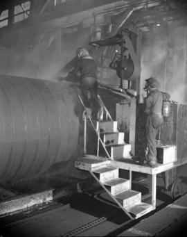 [Men making a boiler at Vancouver Iron Works Ltd.]