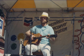 Guitarist performing on Chevron Stage