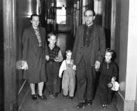 [Hungarian refugees in the Immigration Building at the airport]