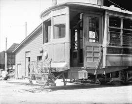 [Front end of streetcar number 815, showing safety fender]