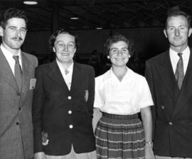 Ilan Bender and Edna Shur, 4-H club delegates from Israel posing with P.N.E. lady director and D....