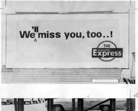 Billboard with Vancouver Express ad affixed