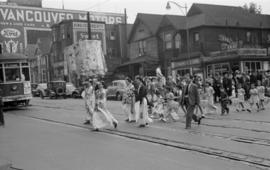 [Chinese parade crossing the 400 Block East Hastings Street during VJ Day celebrations]