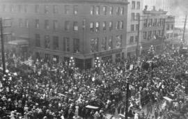 [Crowds outside the C.P.R. Station for the embarkation of the first overseas troops]