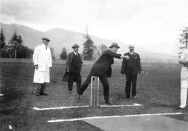 [Mayor L.D. Taylor bowling the first ball at opening of cricket season, Brockton Point Oval]