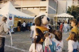 Tillicum interacting with group of children