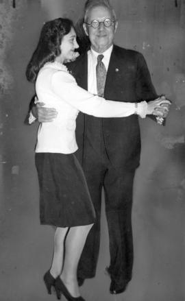 [Frank Harris and Miss B. Roeder dance at a pioneer's gathering]