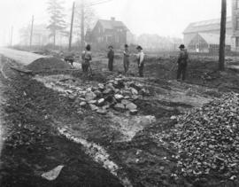 [The bituminous macadam being repaired on Cambie Street between 10th Avenue and 12th Avenue]