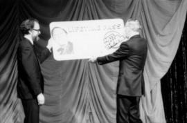 Hugh Pickett receives lifetime pass to the Arts Club Theatre from Bill Millerd