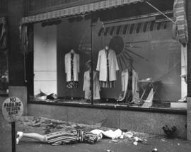 [A retail store window smashed after 'sit down strikers' were evicted from the Vancouver Art Gall...