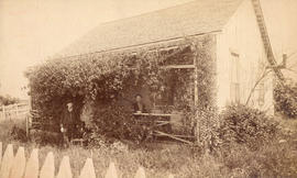 [The Caufield brothers in front of their cottage at Hastings Sawmill]