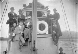 [Unidentified men on boat in Skeena River]