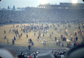 End of 43rd Grey Cup game at Empire Stadium, crowd at end zone