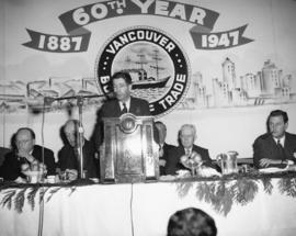 [Harold Merilees, Chairman speaking at the 60th anniversary of the Vancouver Board of Trade]