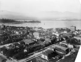 [Birds-eye view of the west-end, western business section of downtown and Stanley Park]